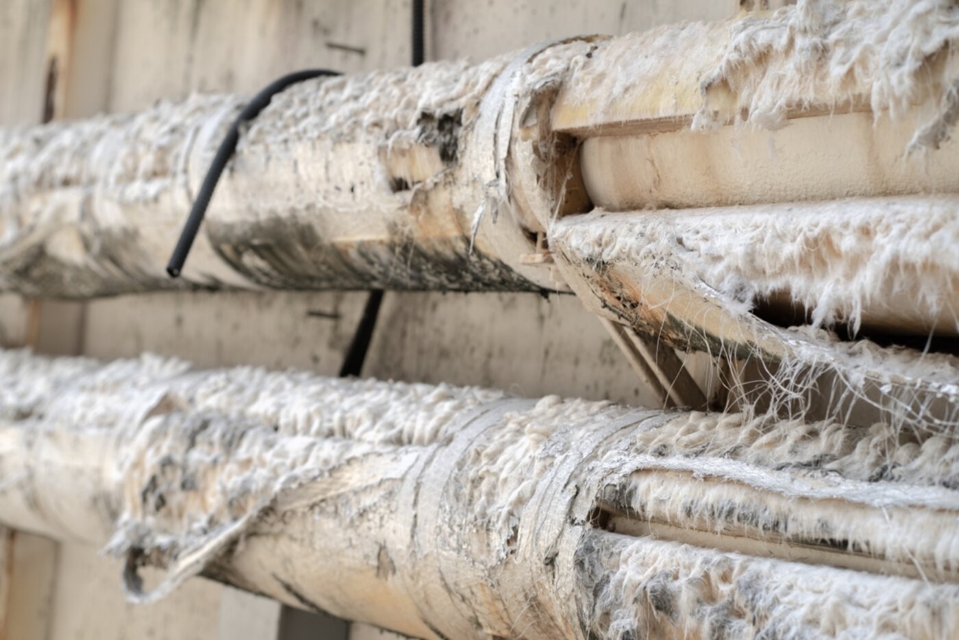 pipe containing asbestos insulation